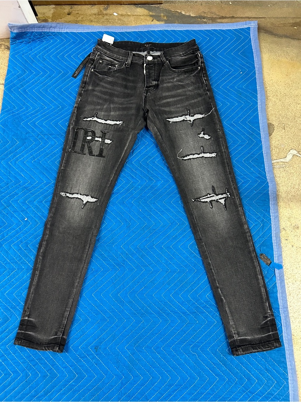 AMIRI Black Distressed Skinny Jeans